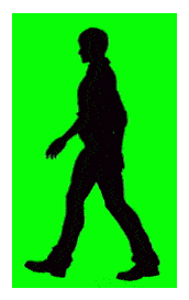 silhouette of a man walking behind a green screen